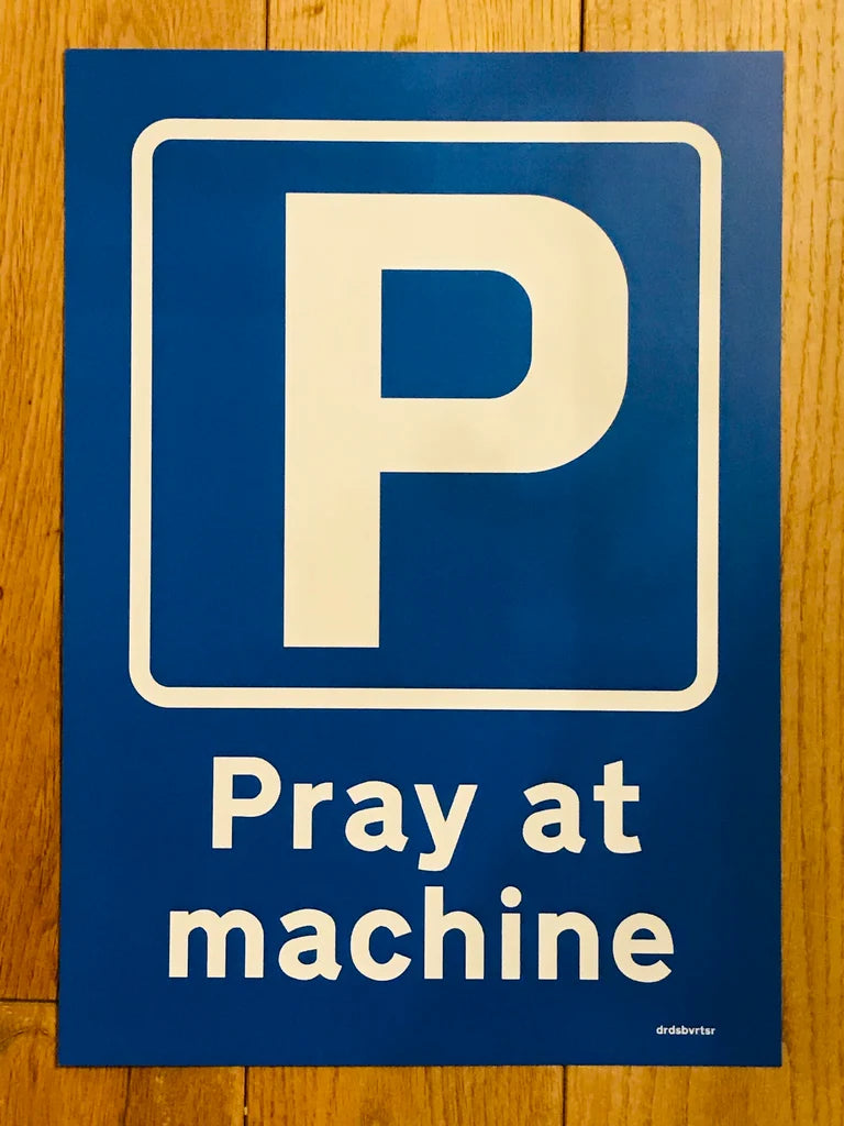 PRAY AT MACHINE ROAD SIGN