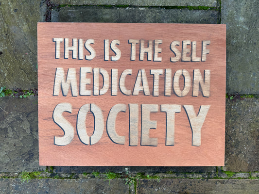 Self Medication Society wooden sign